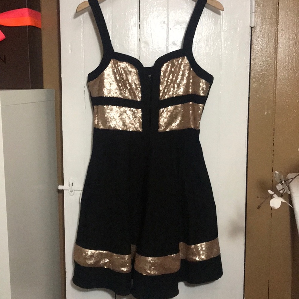 Black and rose gold sequin dress